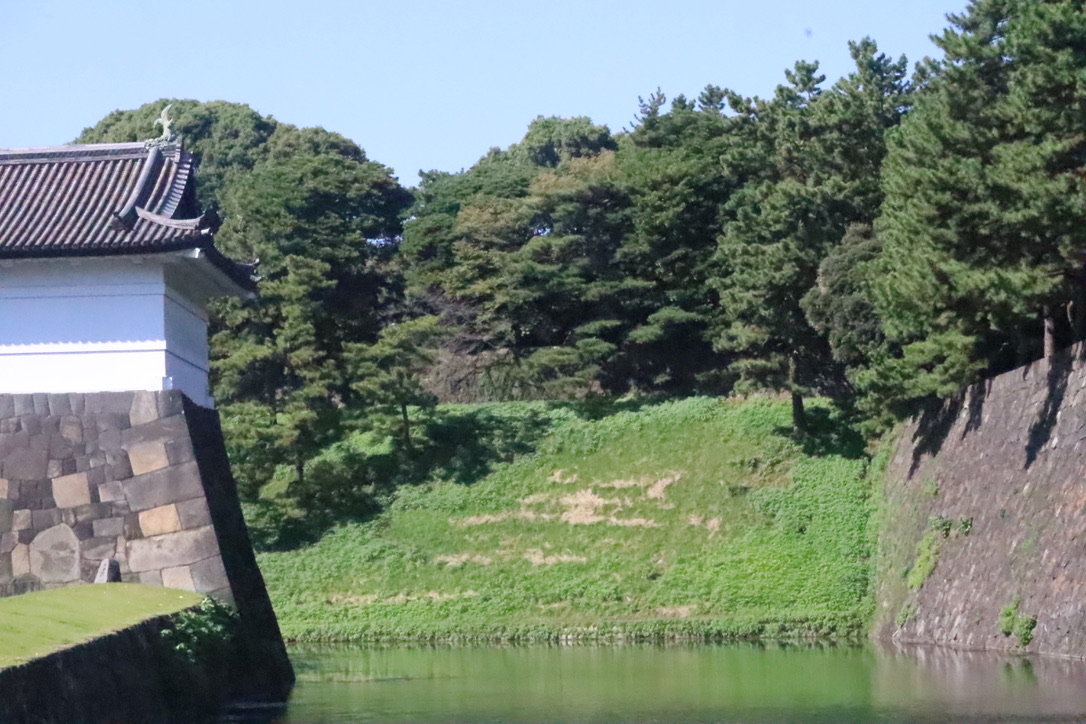 Tokyo Emperors palace steep embankment in background of the castles moat